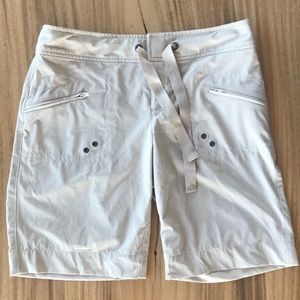 Athleta zippered pockets, tan quick dry shorts